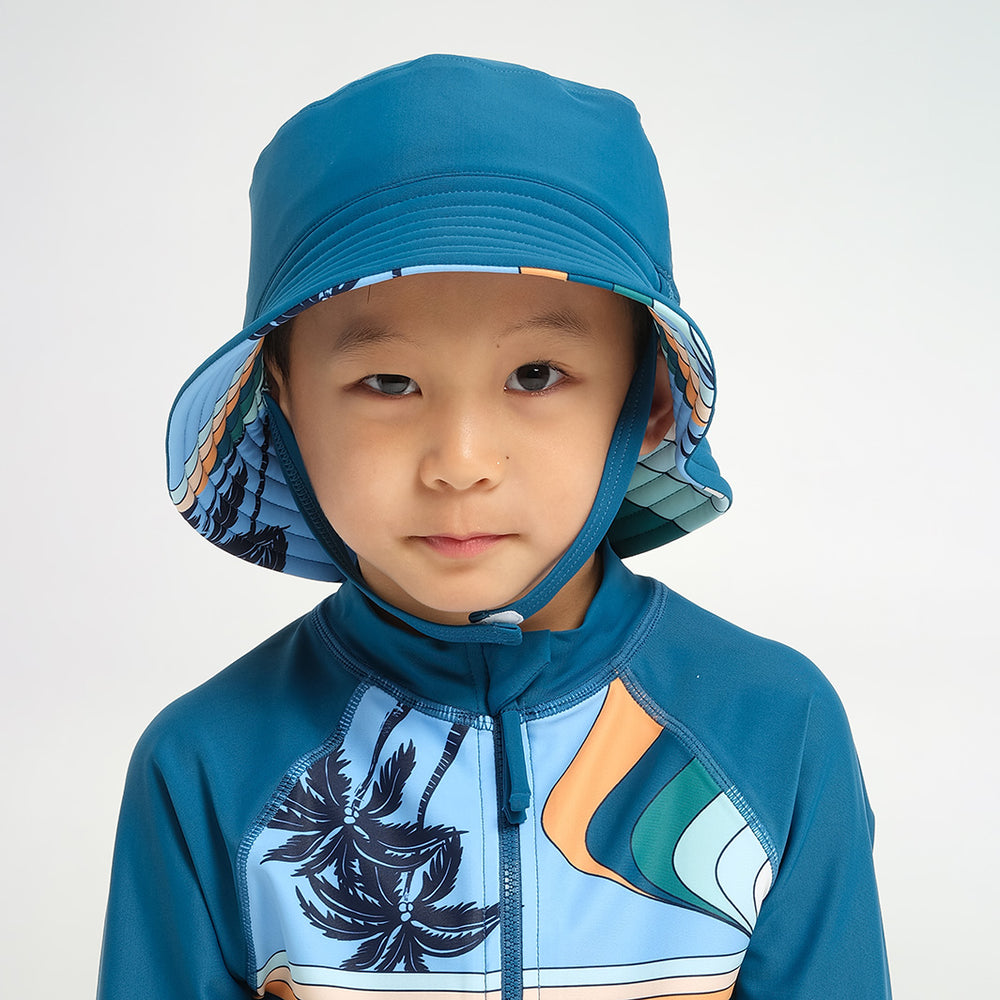 Infant Palm Waves Reversible Bucket Swim Hat – Cancer Council Shop