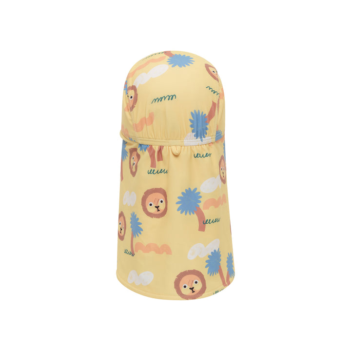 A baby sun hat with a neck flap, featuring a light yellow base color and a playful print of cartoon lions, palm trees, and clouds in blue, brown, and white.