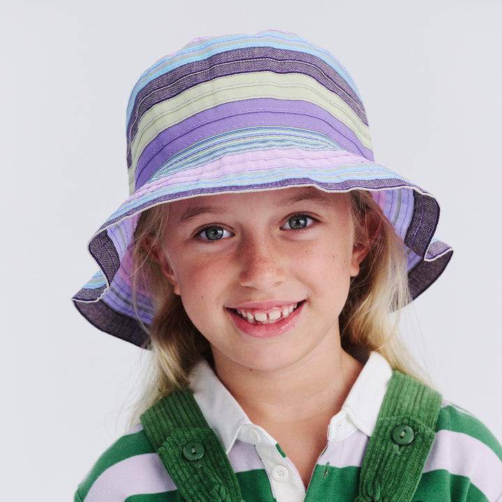 Kid model wearing Chloe bucket hat in Lilac, front facing