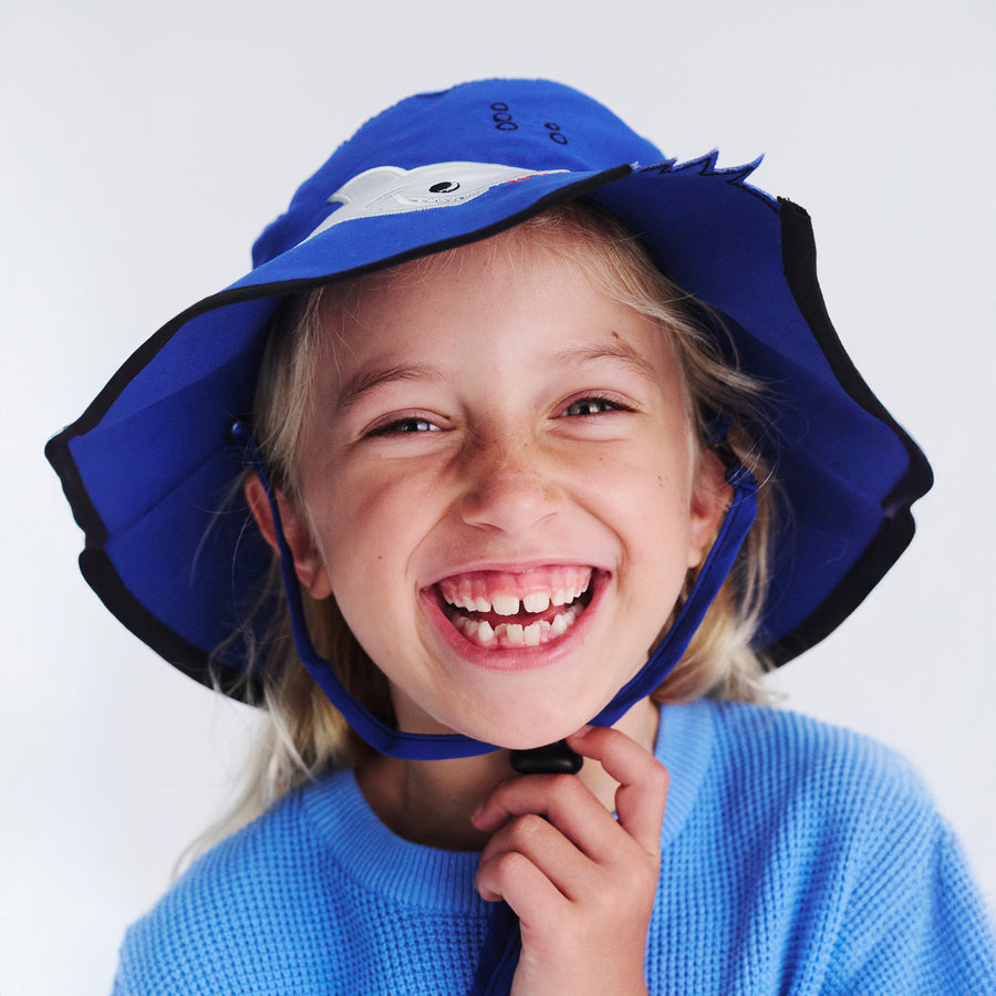 Model wearing Awesome wide brim hat in Blue Shark, front‑facing view