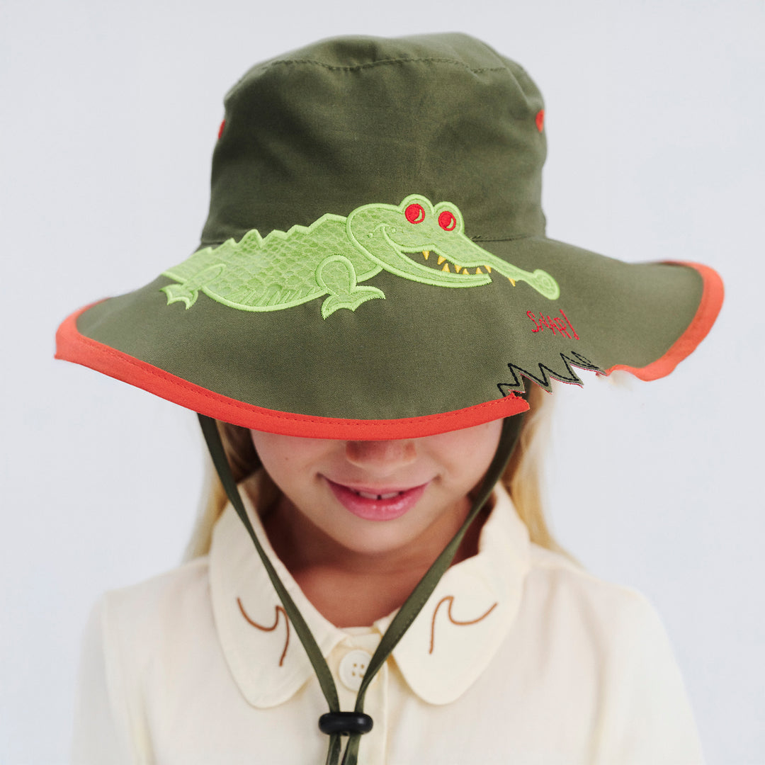 Model wearing Awesome wide brim hat in Khaki Croc, front‑facing with brim detail shown