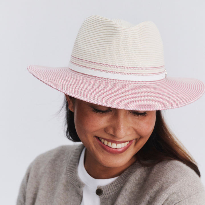 Female model wearing Heritage Town and Country Hat in Ivory/Pink colour, front view showcasing fit and wide brim