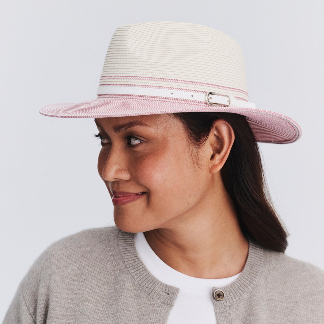 Female model wearing Heritage Town and Country Hat in Ivory/Pink colour, side profile showing brim coverage