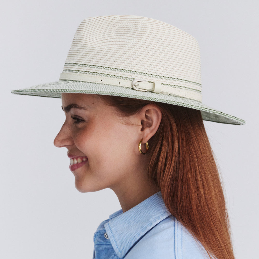 Female model wearing Heritage Town and Country Hat in ivory and sage colour, side profile showing structured silhouette