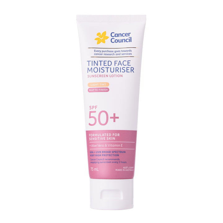 A 75 mL squeeze tube of Cancer Council Tinted Face Moisturiser SPF 50+ sunscreen lotion. The tube is white with blue and pink text and graphics, featuring the Cancer Council logo at the top and a white flip-top cap at the bottom, set against a plain white background.