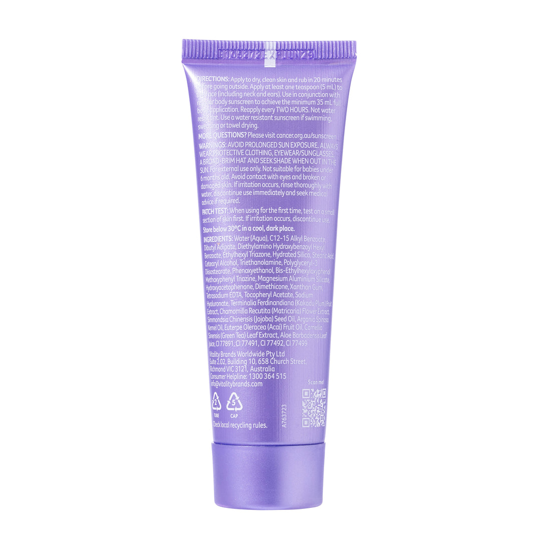 A purple squeeze tube of sunscreen shown from the back, featuring white text detailing functions, instructions, warnings, and ingredients, set against a plain white background.