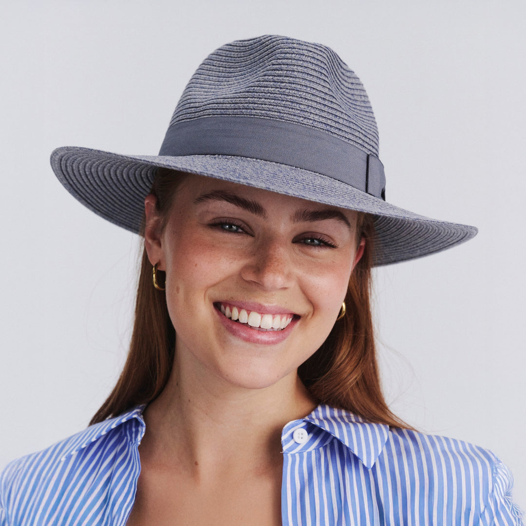 Female model wearing Sherry Fedora Hat in Mixed Blue colour, front view showcasing fit and wide brim