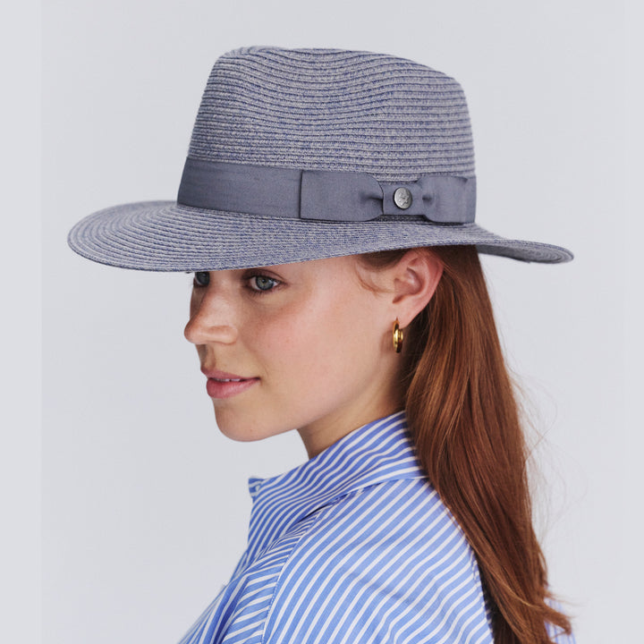 Female model wearing Sherry Fedora Hat in Mixed Blue colour, side profile showing brim coverage