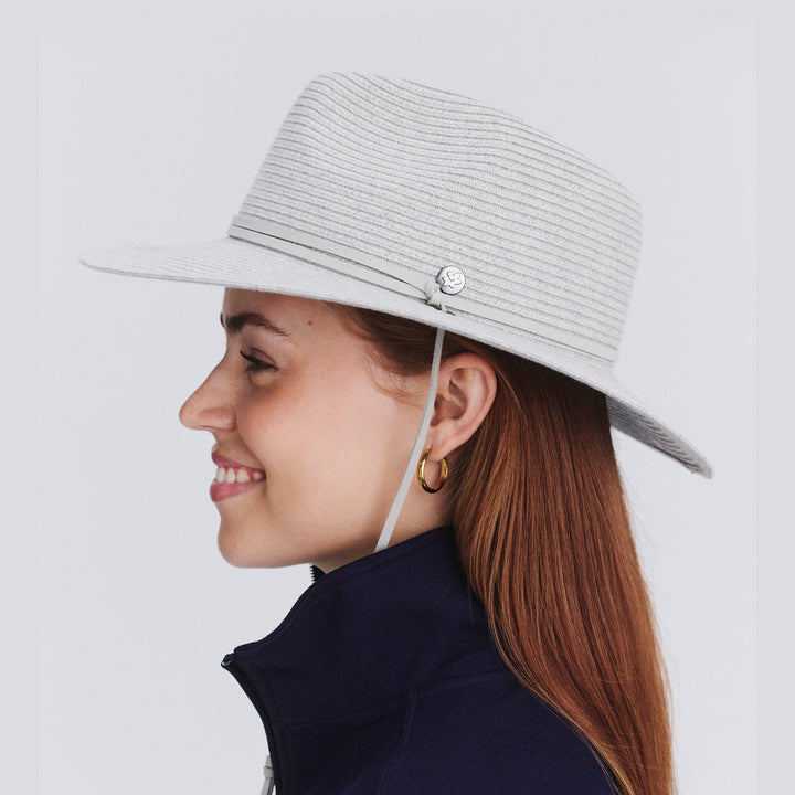 Female model wearing Jody Fedora Hat in Light Grey colour, side profile showing brim coverage