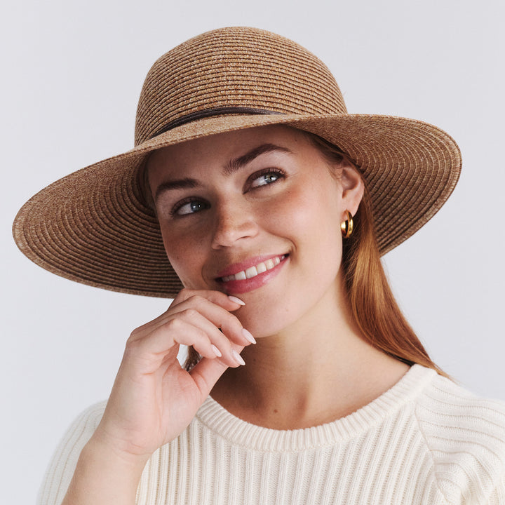 Female model wearing Maribel Cloche Hat in Cinnamon colour, front view showcasing fit and wide brim