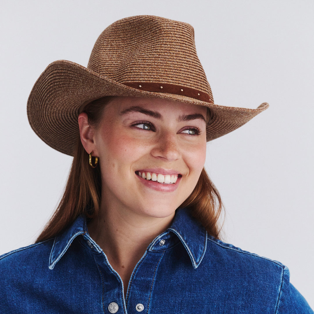 Female model wearing Jace Cowboy Hat in Cinnamon colour, front view showcasing fit and wide brim