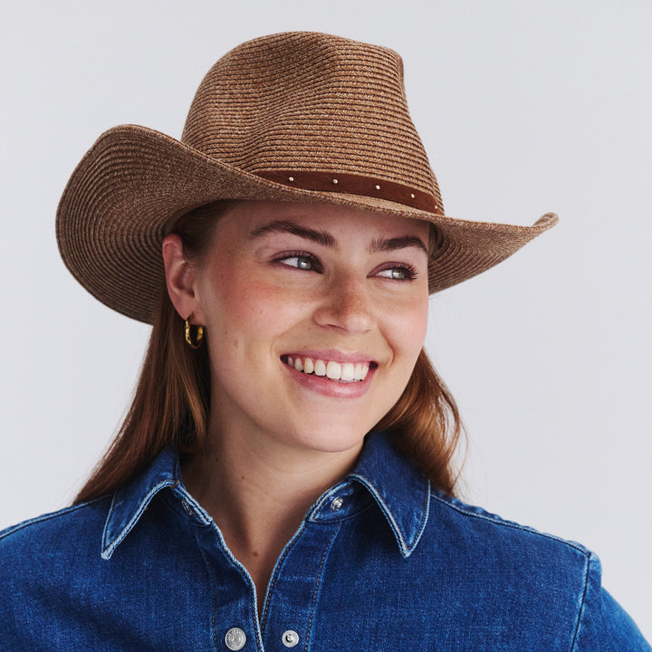 Female model wearing Jace Cowboy Hat in Cinnamon colour, front view showcasing fit and wide brim