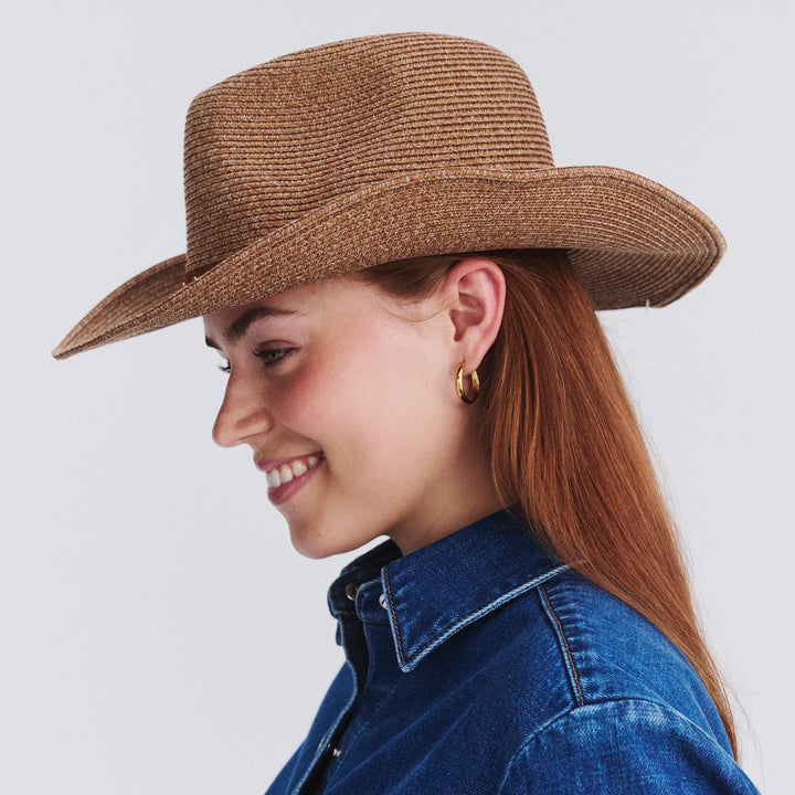 Female model wearing Jace Cowboy Hat in Cinnamon colour, side profile showing brim coverage
