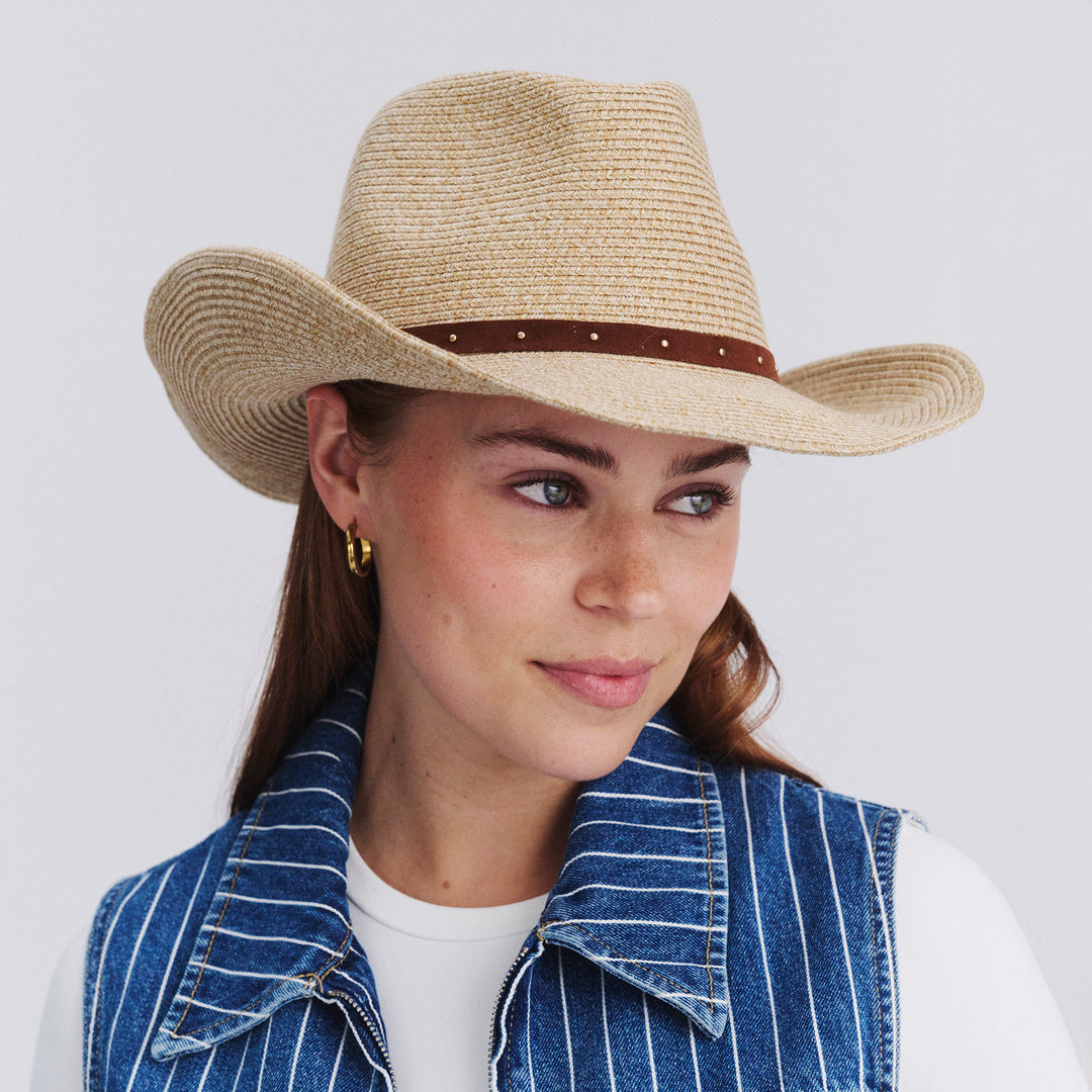 Female model wearing Jace Cowboy Hat in Natural colour, front view showcasing fit and wide brim