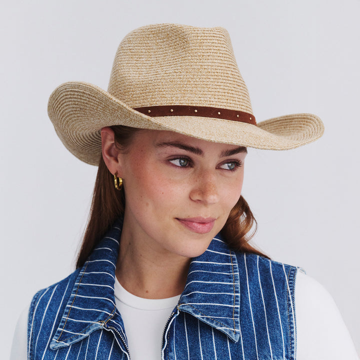 Female model wearing Jace Cowboy Hat in Natural colour, front view showcasing fit and wide brim