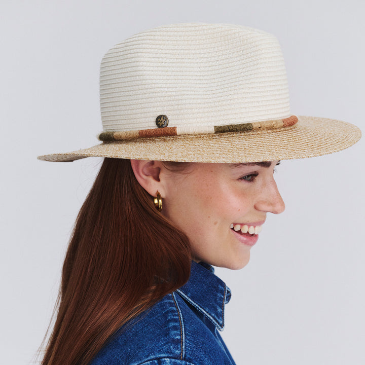 Female model wearing Sasha Fedora Hat in Ivory/Natural colour, side profile showing brim coverage