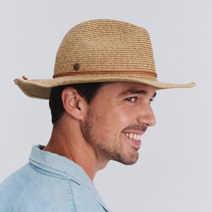 Male model wearing Kasey Cowboy Hat in Camel colour, side profile showing brim coverage