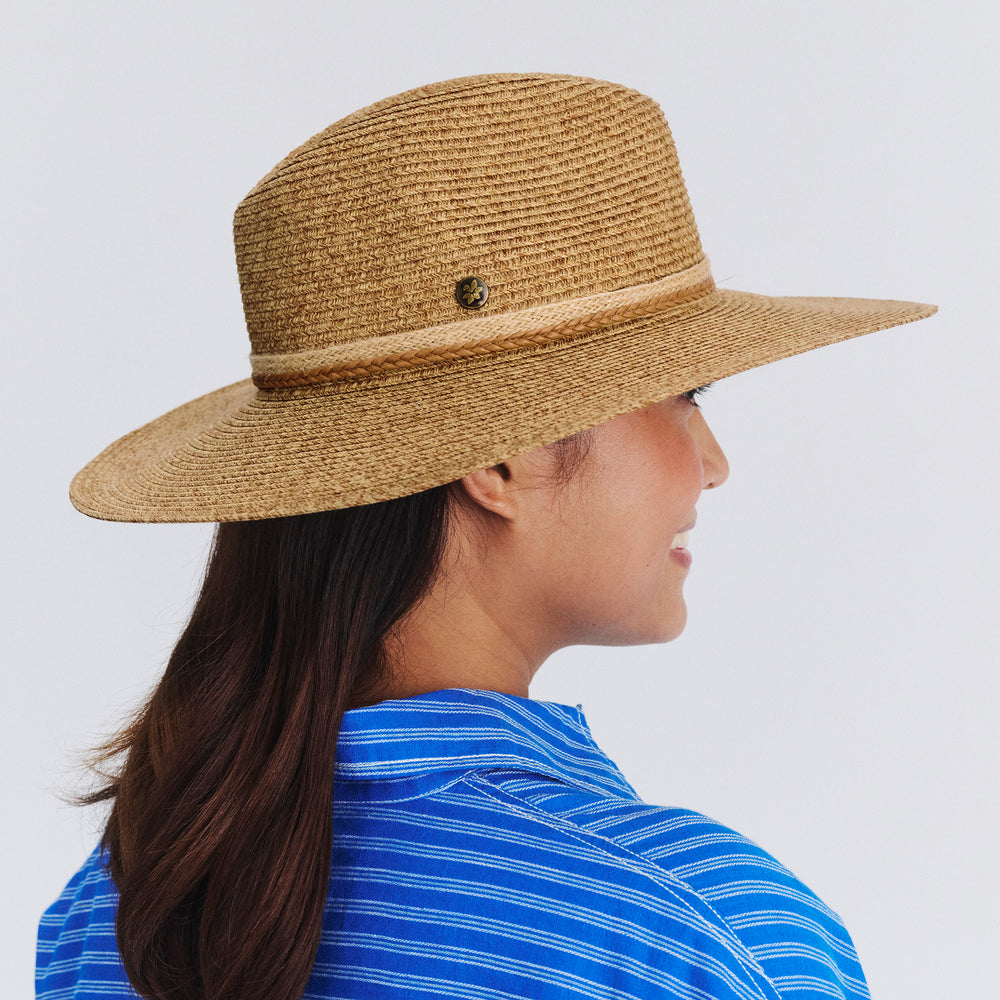 Female model wearing Roxy Wide Brim Fedora Hat in Camel colour, side profile showing brim coverage