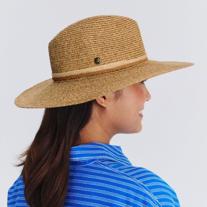 Female model wearing Roxy Wide Brim Fedora Hat in Camel colour, side profile showing brim coverage