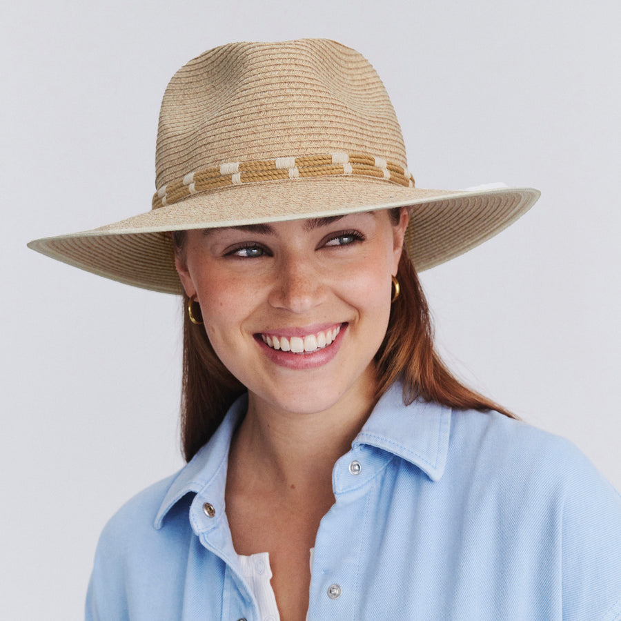 Female model wearing Tessa Fedora Hat in mixed camel colour, front view showcasing structured crown and wide brim