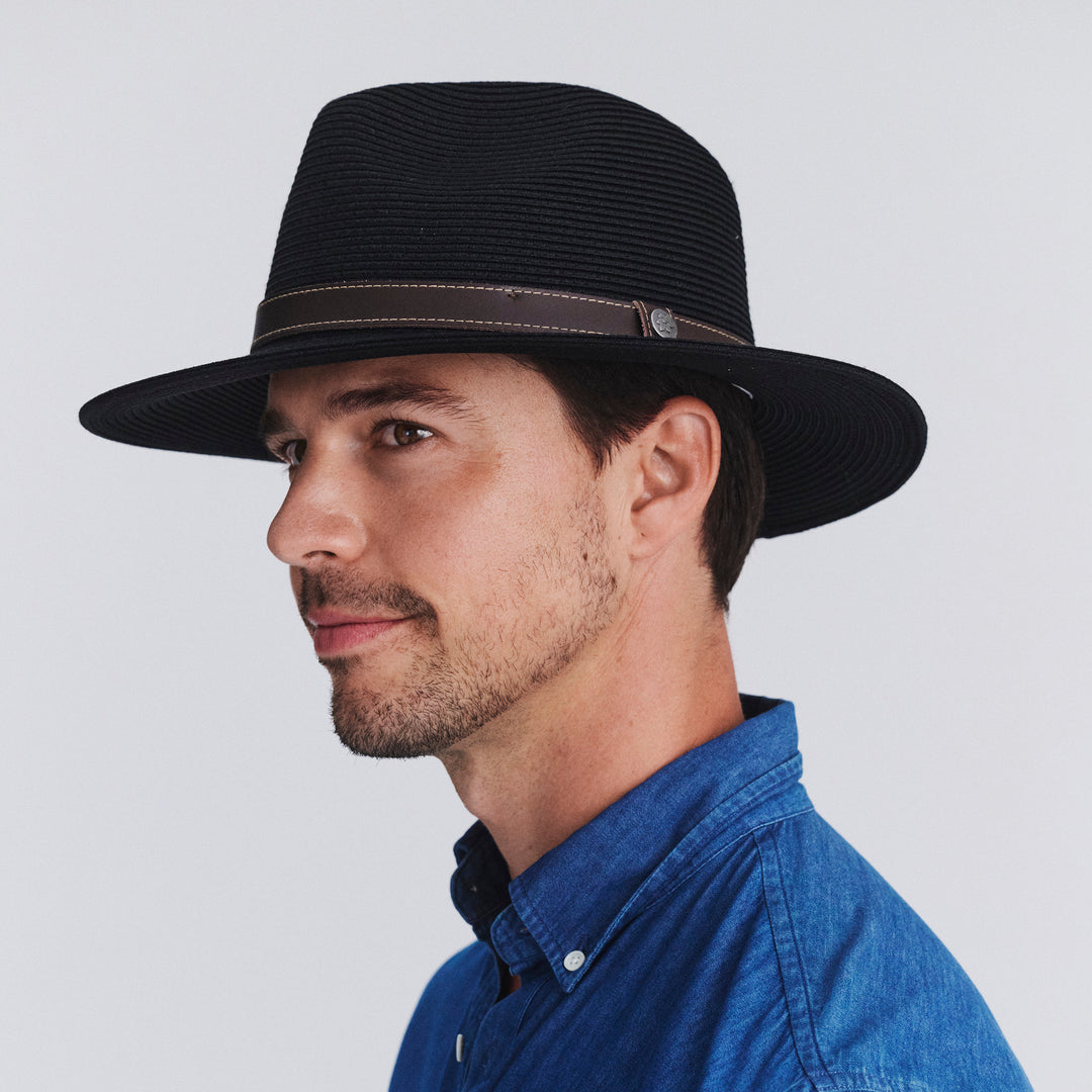 Male model wearing Morgan Fedora Hat in black colour, side profile showing brim width and silhouette