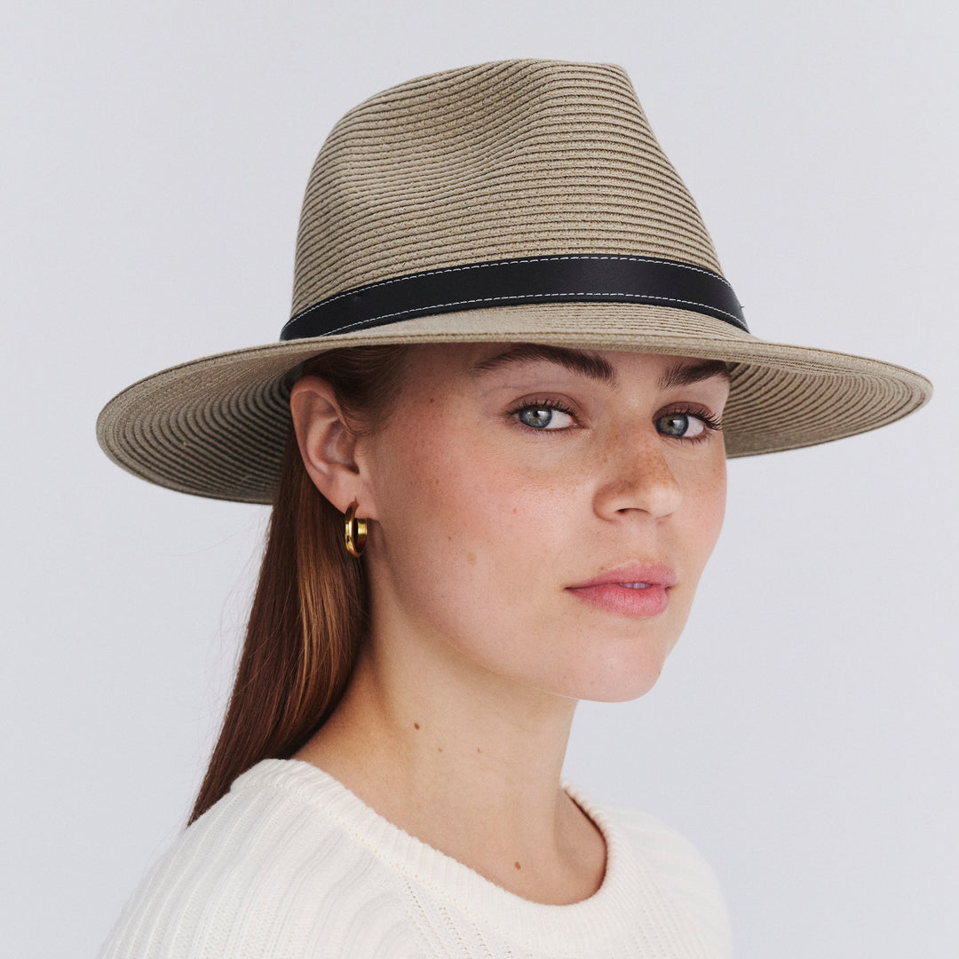 Female model wearing Morgan Fedora Hat in light khaki colour, angled view highlighting crown and brim