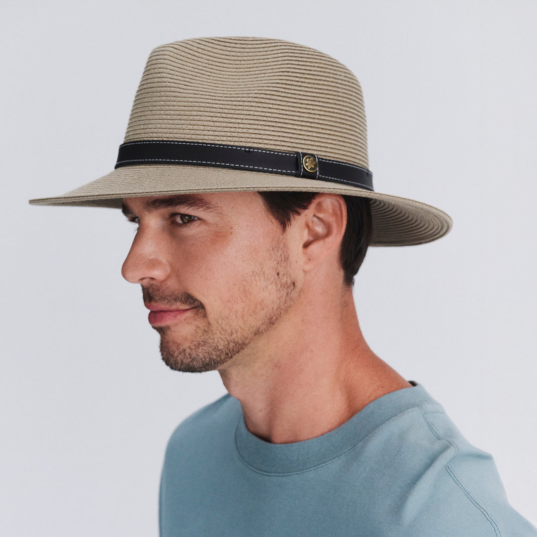 Male model wearing Morgan Fedora Hat in light khaki colour, side profile showing brim width and silhouette