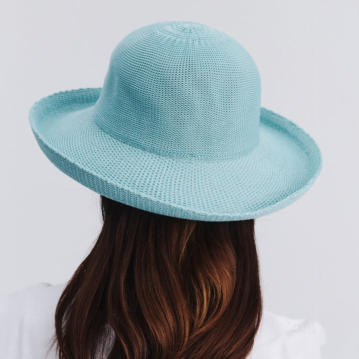 Female model wearing Classic Breton Hat in blue haze colour, back view showing fit and rear crown shape