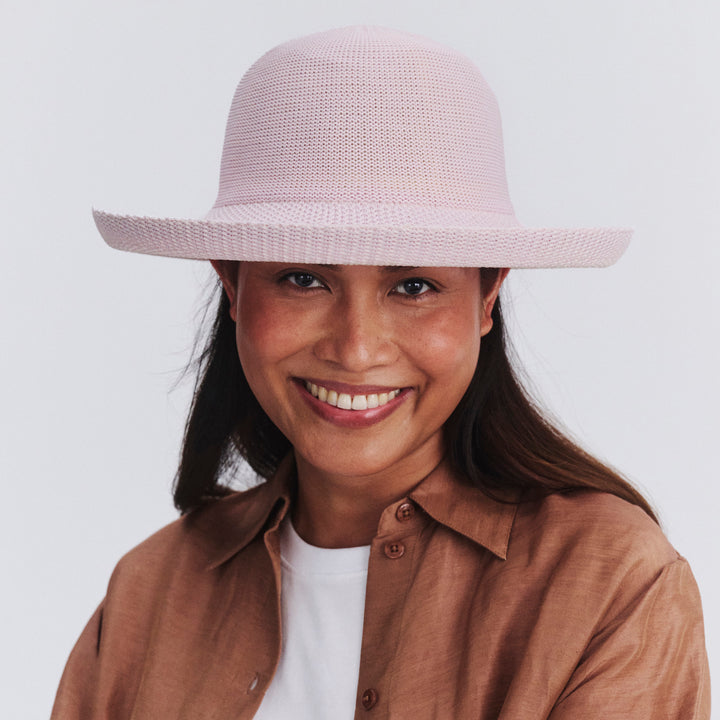 Female model wearing Classic Breton Hat in Lilac colour, front view showcasing fit and wide brim