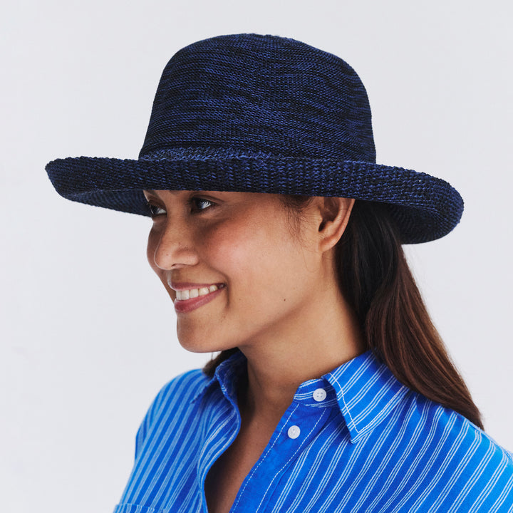 Side profile of female model wearing Classic Breton hat in Mixed Navy