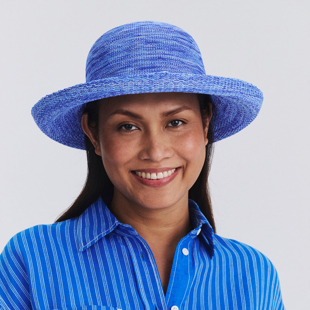 Female model wearing Classic Breton hat in Mixed Ocean, front‑facing view