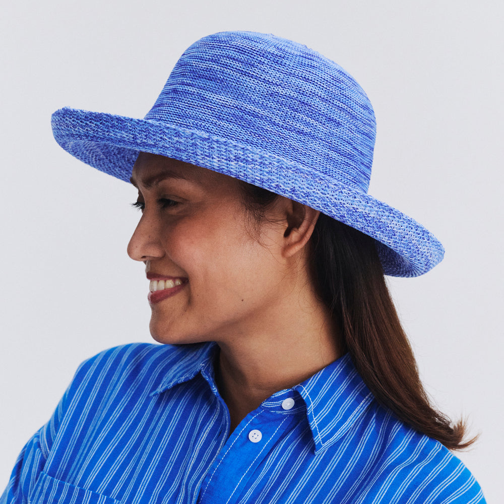 Female model wearing Classic Breton hat in Mixed Ocean, three‑quarter angle