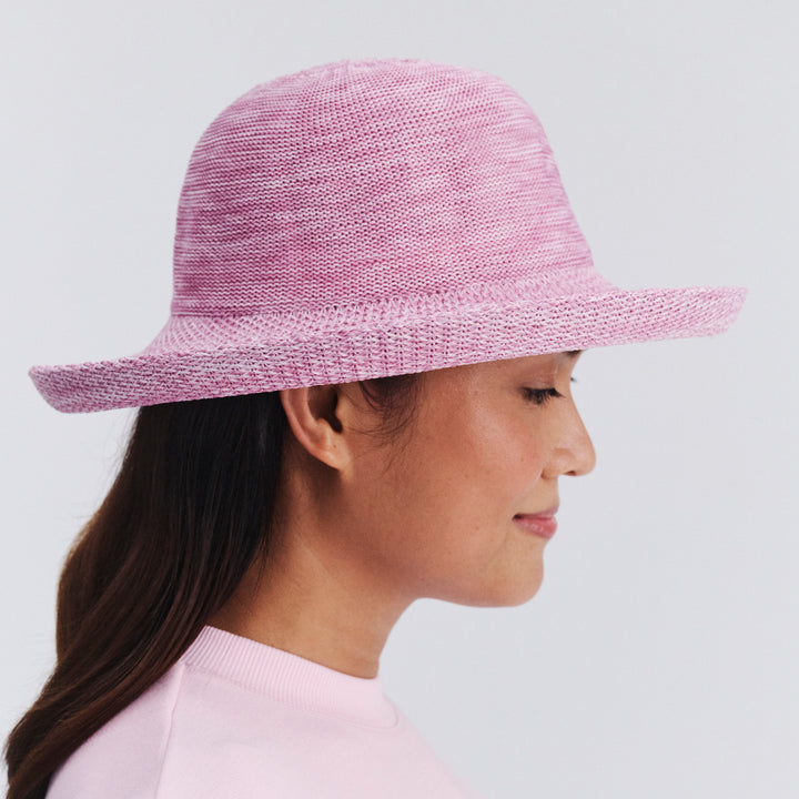 Side profile of female model wearing Classic Breton hat in Old Rose Pink