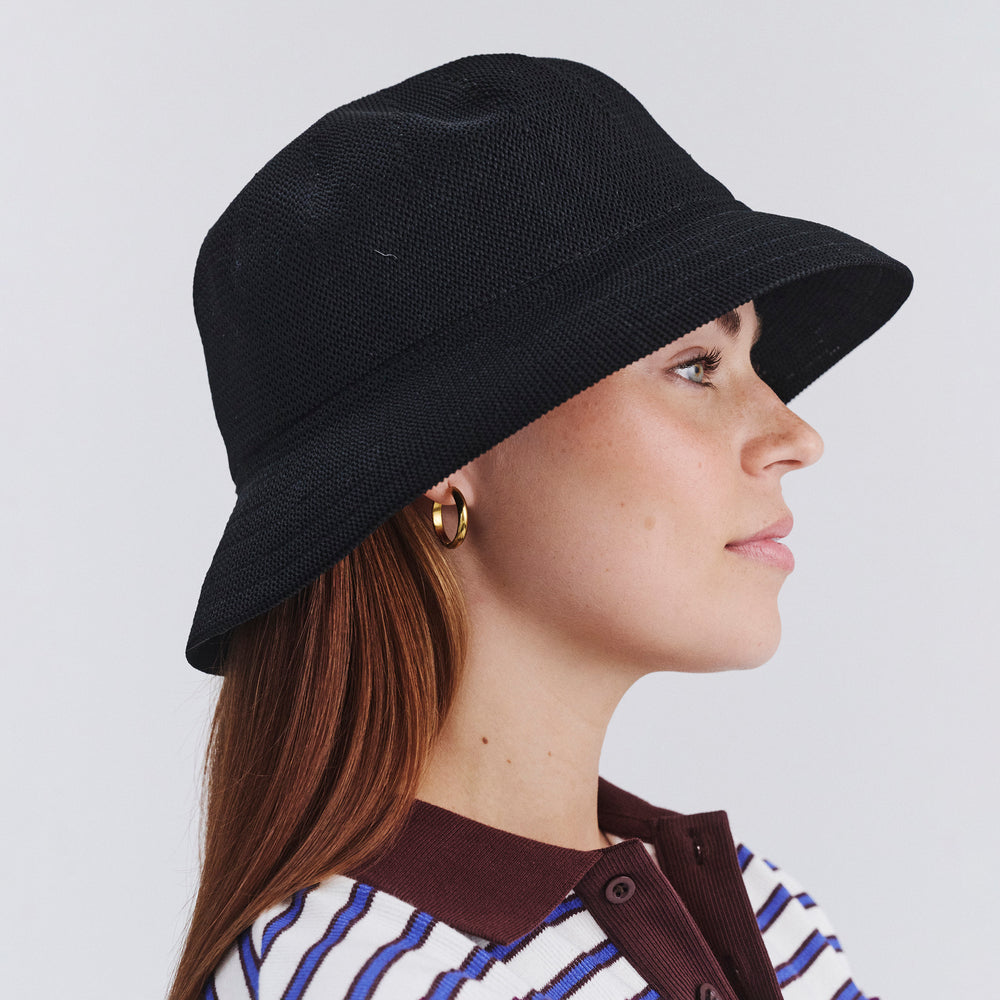Side profile of female model wearing Tamzin bucket hat in Black