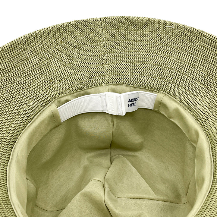 Tamzin Bucket Hat in light moss green colour, underside of brim showing stitching detail, interior finish, and built-in size adjuster