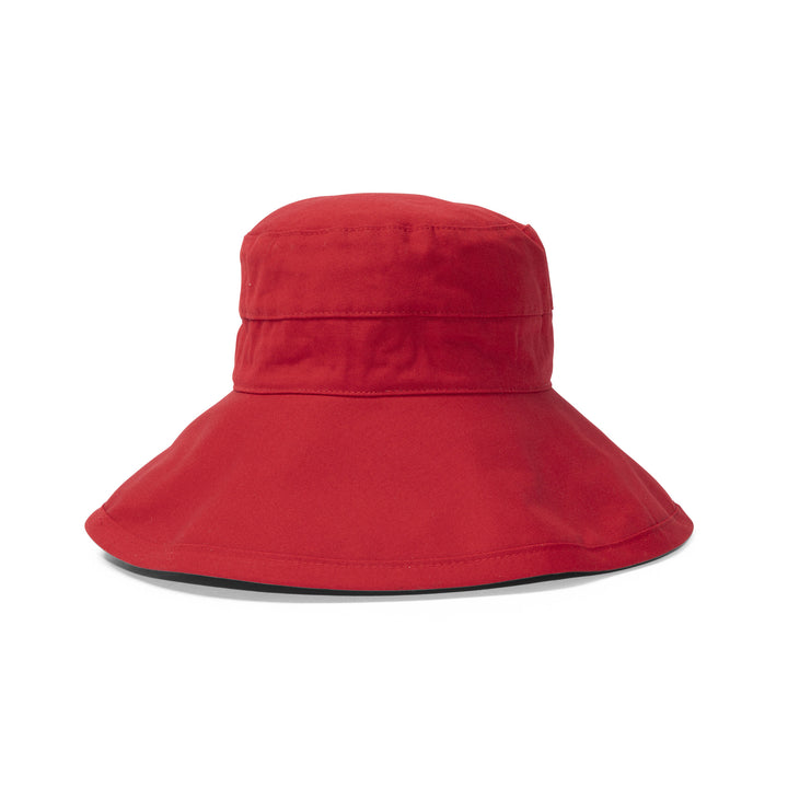 Essential Traveller Hat in poppy red colour, angled product view showing structured crown and wide down turned brim