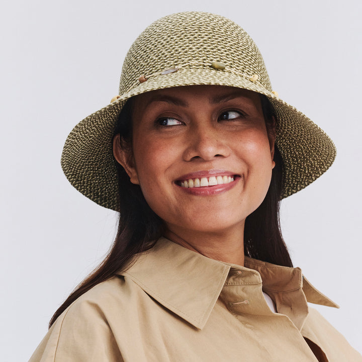 Female model wearing Bohemian bucket hat in Pistachio, front‑facing view
