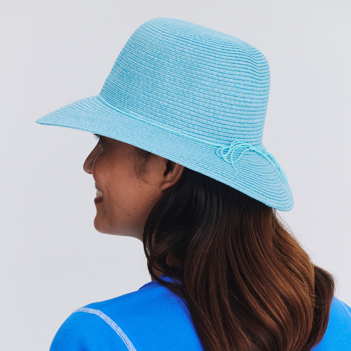 Side profile of female model wearing Lacey bucket hat in Mixed Blue