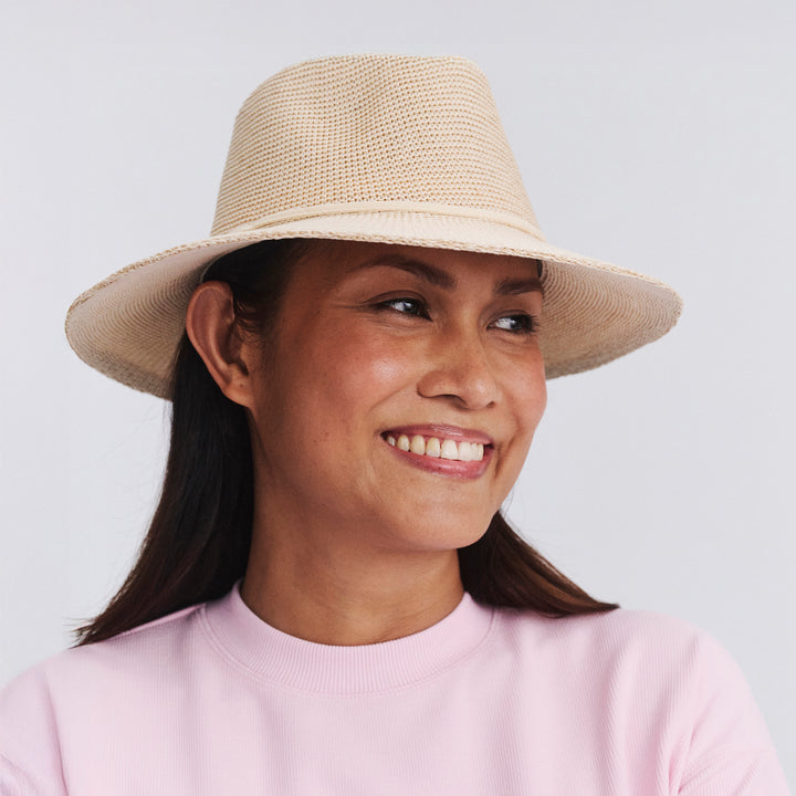 Female model wearing Jacqui mannish hat in Beige, front‑facing view