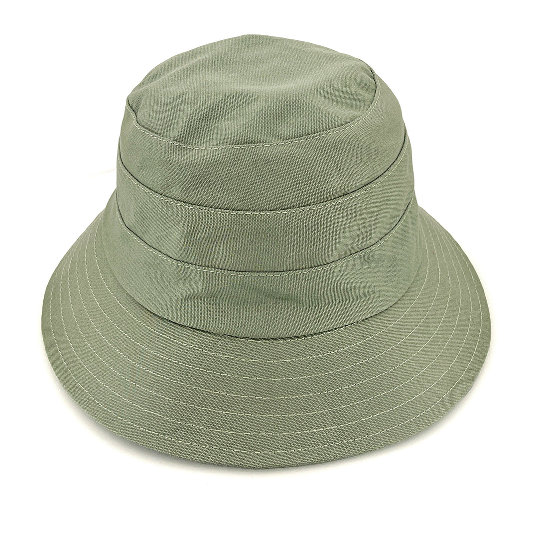 Golf Bucket Hat in sage colour, front view highlighting classic bucket shape, stitching detail, and sun-protective brim coverage