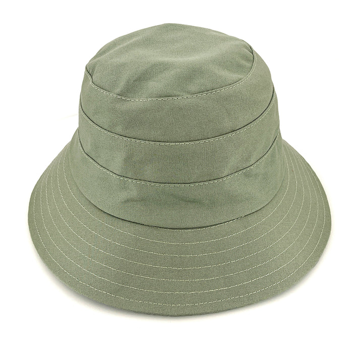 Golf Bucket Hat in sage colour, front view highlighting classic bucket shape, stitching detail, and sun-protective brim coverage