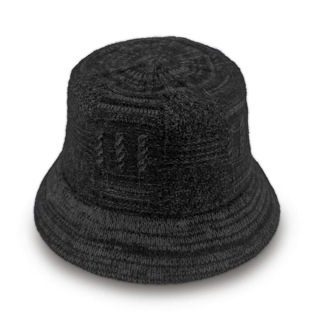 Jordan Bucket Hat in black soft wool, side profile showing soft structure and brim length