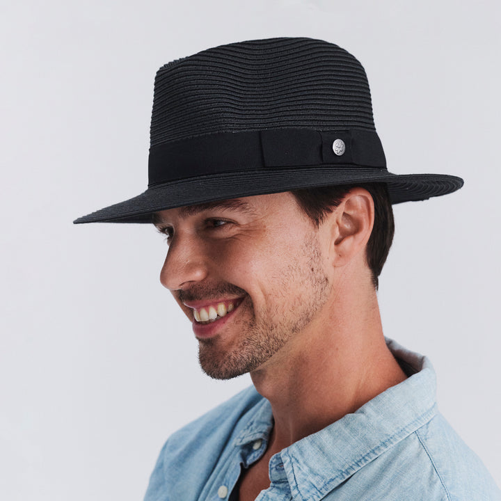 Male model wearing Cafe Fedora Hat in Black colour, side profile showing brim coverage
