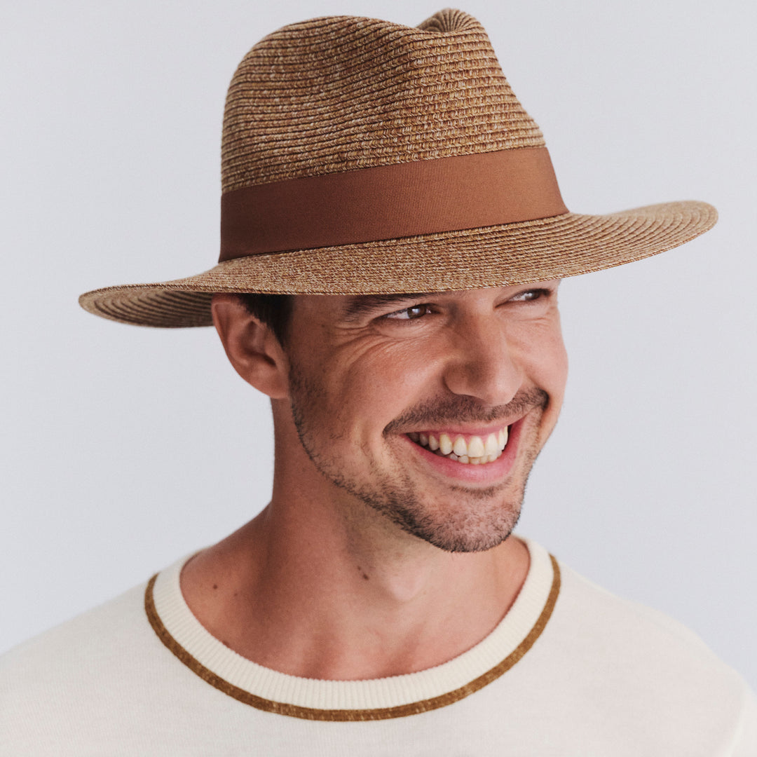 Male model wearing Cafe Fedora Hat in Cinnamon colour, slight angle highlighting shape and silhouette
