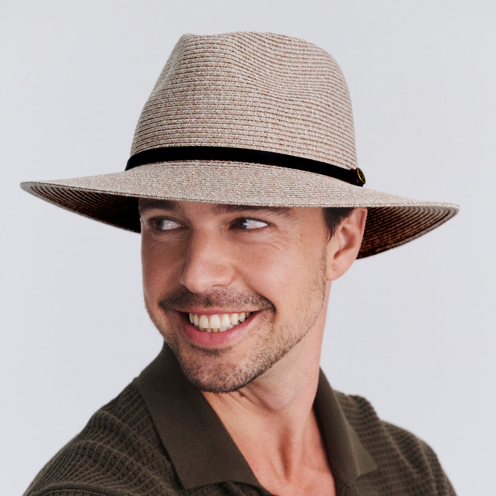 Male model wearing Darby fedora hat in Camel Mix, front‑facing view