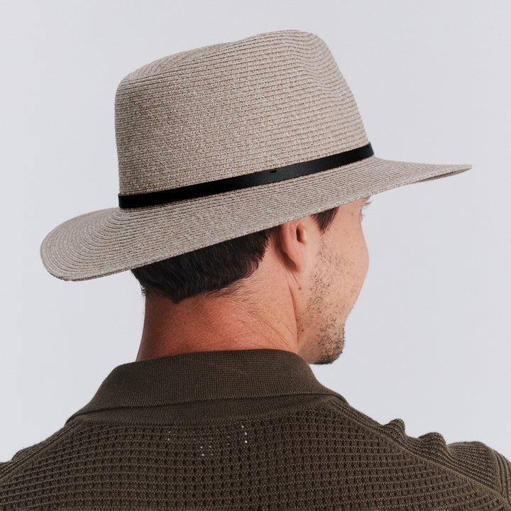 Back view of model wearing Darby fedora hat in Camel Mix showing brim shape and rear detailing