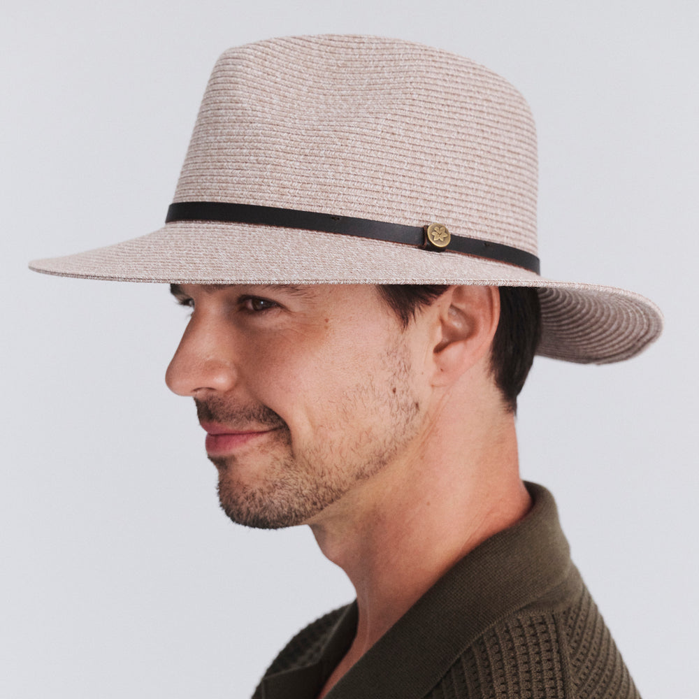 Side profile of model wearing Darby fedora hat in Camel Mix