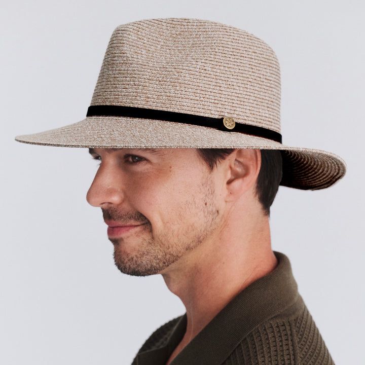 Side profile of male model wearing Darby fedora hat in Camel Mix