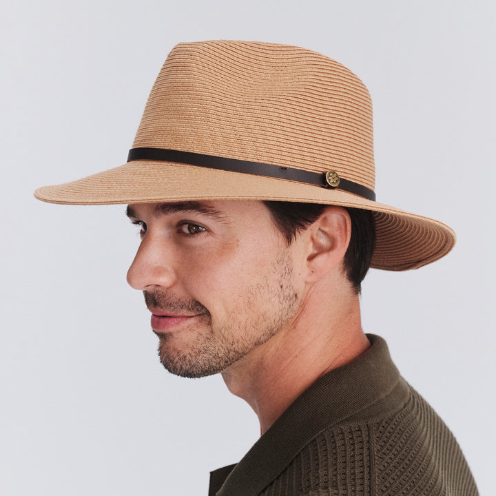 Model wearing Darby fedora hat in Sahara, three‑quarter angle