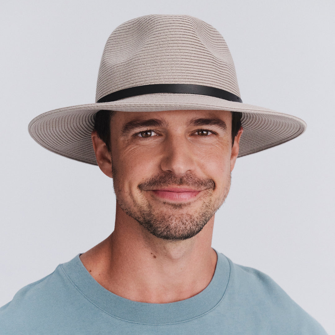 Model wearing Darby fedora hat in Stone, facing the front